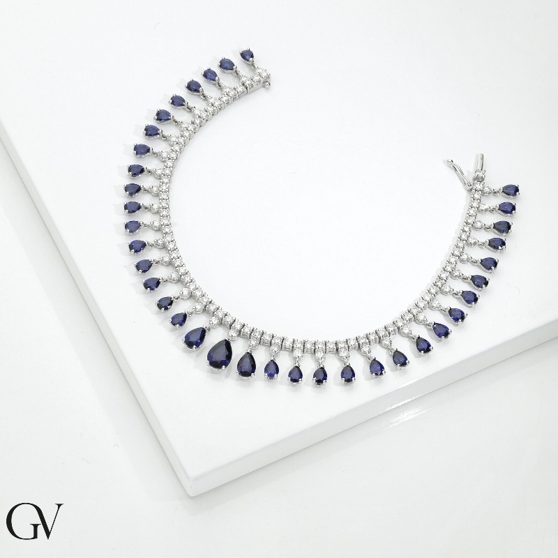 Tennis design bracelet with diamonds and blue sapphires in gold 750 Tennis design bracelet with diamonds and blue sapphires in gold 750