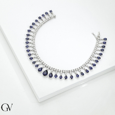 Tennis design bracelet with diamonds and blue sapphires in gold 750