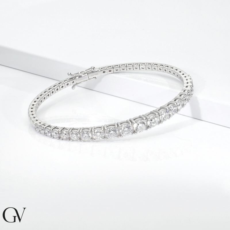 18k white gold semi rigid bracelet with graduated diamonds 18k white gold semi rigid bracelet with graduated diamonds