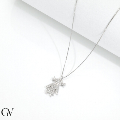 18k white gold necklace with little girl pendant in diamonds