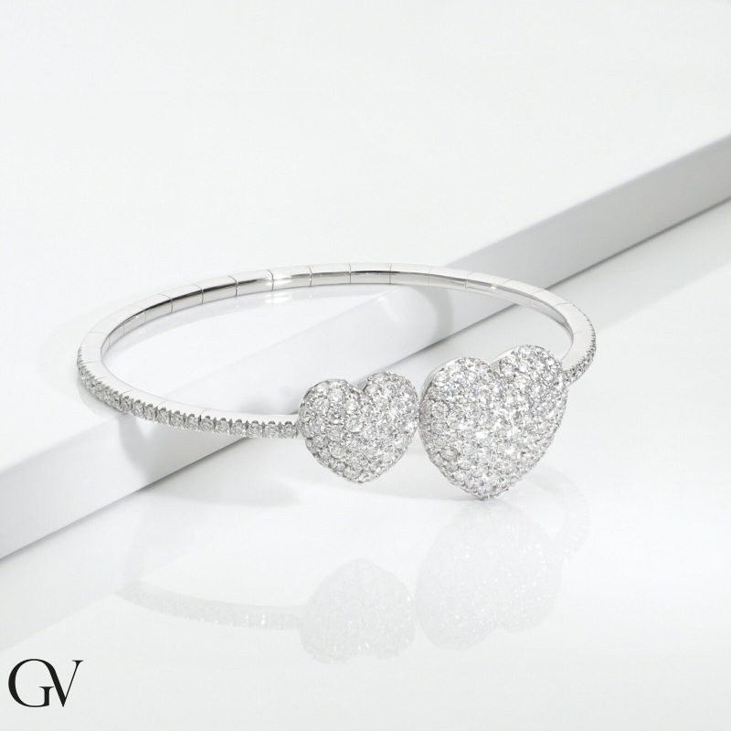 Bracelet in white gold 18k with two hearts in diamonds Bracelet in white gold 18k with two hearts in diamonds