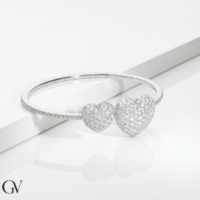 Bracelet in white gold 18k with two hearts in diamonds