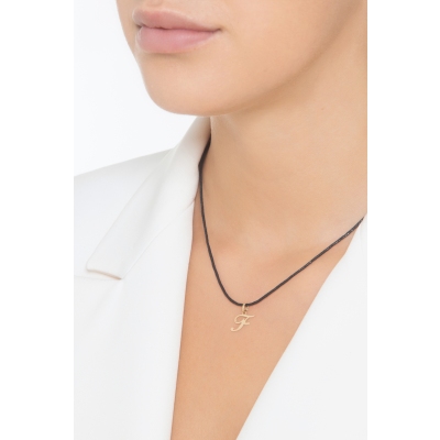 Pendant with initial letter F in italic in 18k yellow gold
