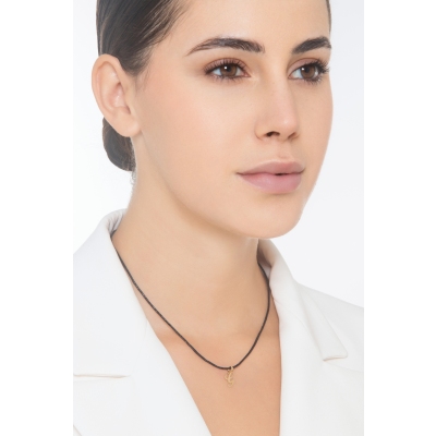 Pendant with initial letter G in italic in 18k yellow gold