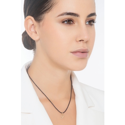 Pendant with initial letter S in italic in 18k yellow gold