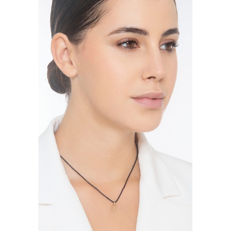 Pendant with initial letter X in italic in 18k yellow gold Pendant with initial letter X in italic in 18k yellow gold