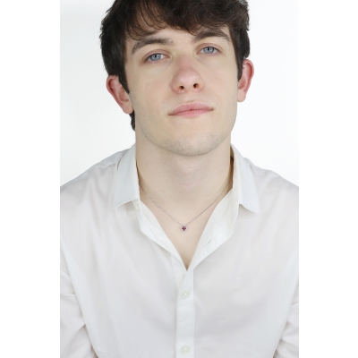 18k white gold necklace with cross in rubies and diamonds