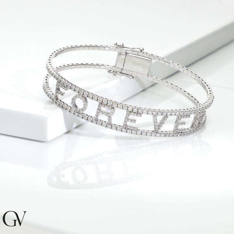 18k white gold rigid bracelet with letters FOREVER in diamonds 18k white gold rigid bracelet with letters FOREVER in diamonds