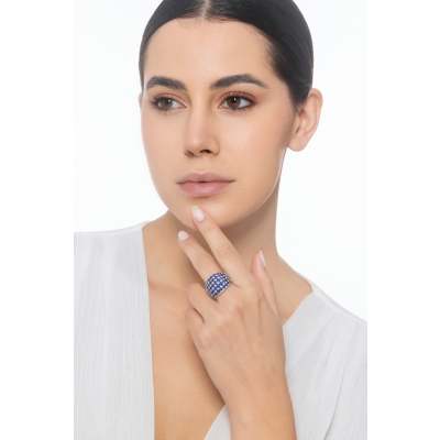 Design ring in white gold 18k with blue sapphires and diamonds