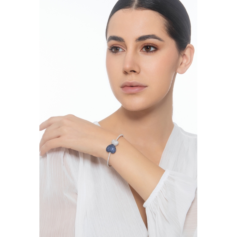 Bracelet in white gold 750 with two hearts in diamonds and blue sapphires Bracelet in white gold 750 with two hearts in diamonds and blue sapphires