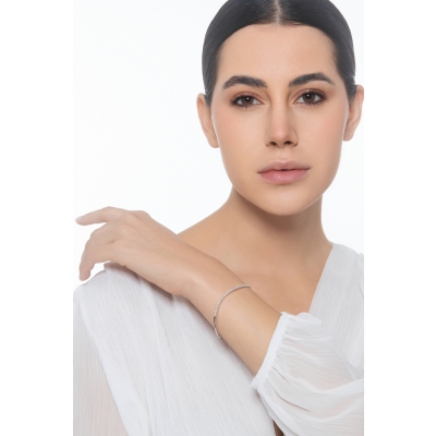 18k white gold semi rigid wavy bracelet with diamonds