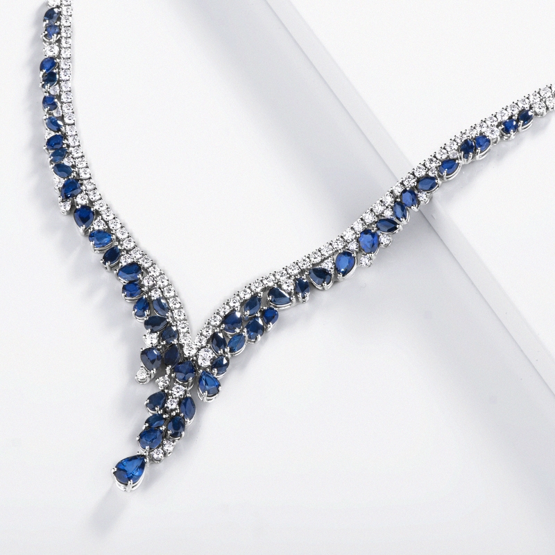 Design tennis necklace with blue sapphires and diamonds Design tennis necklace with blue sapphires and diamonds