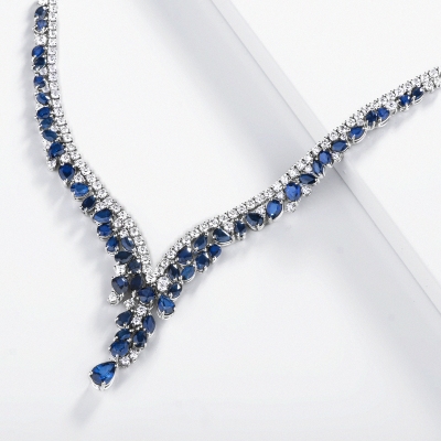 Design tennis necklace with blue sapphires and diamonds