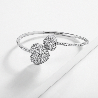 18k white gold bracelet with two hearts in diamonds