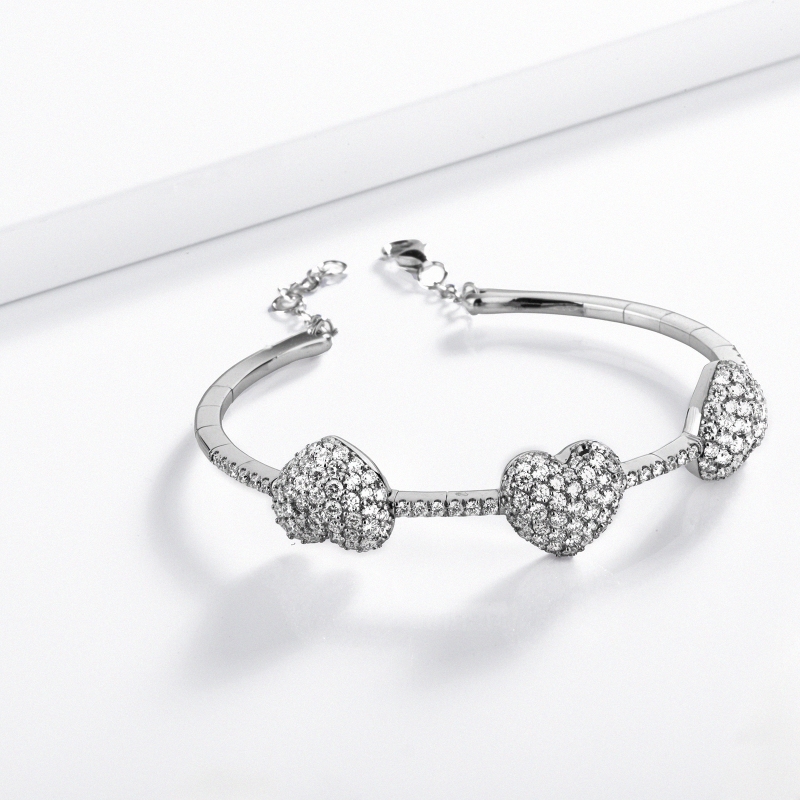 750 white gold spring bracelet with 3 hearts in diamonds 750 white gold spring bracelet with 3 hearts in diamonds