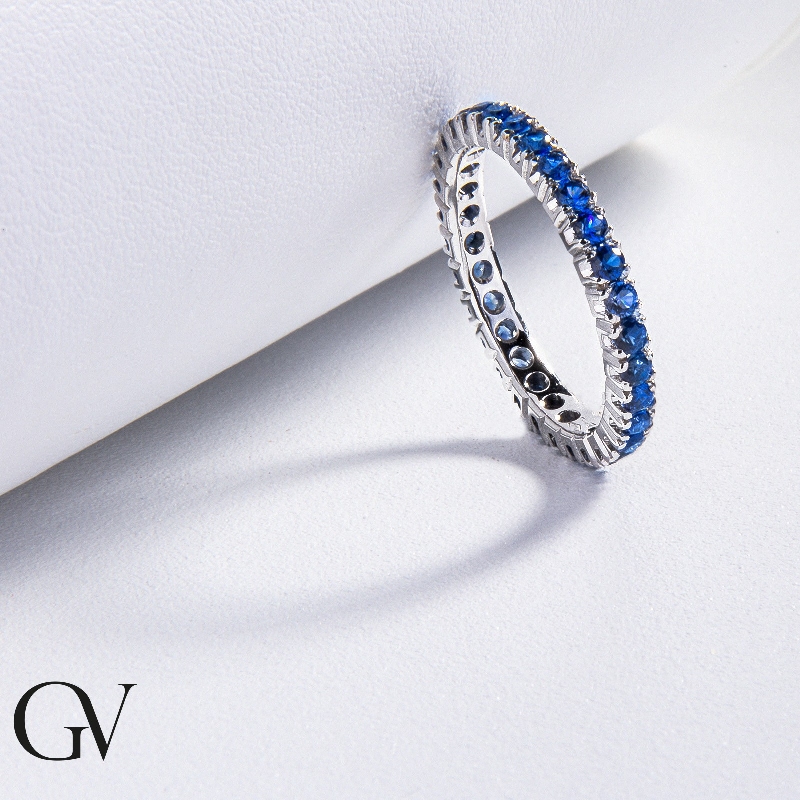 Full eternity ring in white gold 18k with blue sapphires  Full eternity ring in white gold 18k with blue sapphires