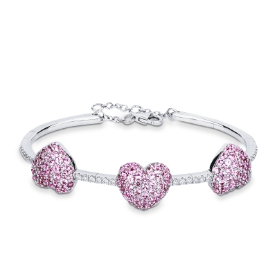 Bracelet in white gold 18k with diamonds and three hearts in pink sapphires