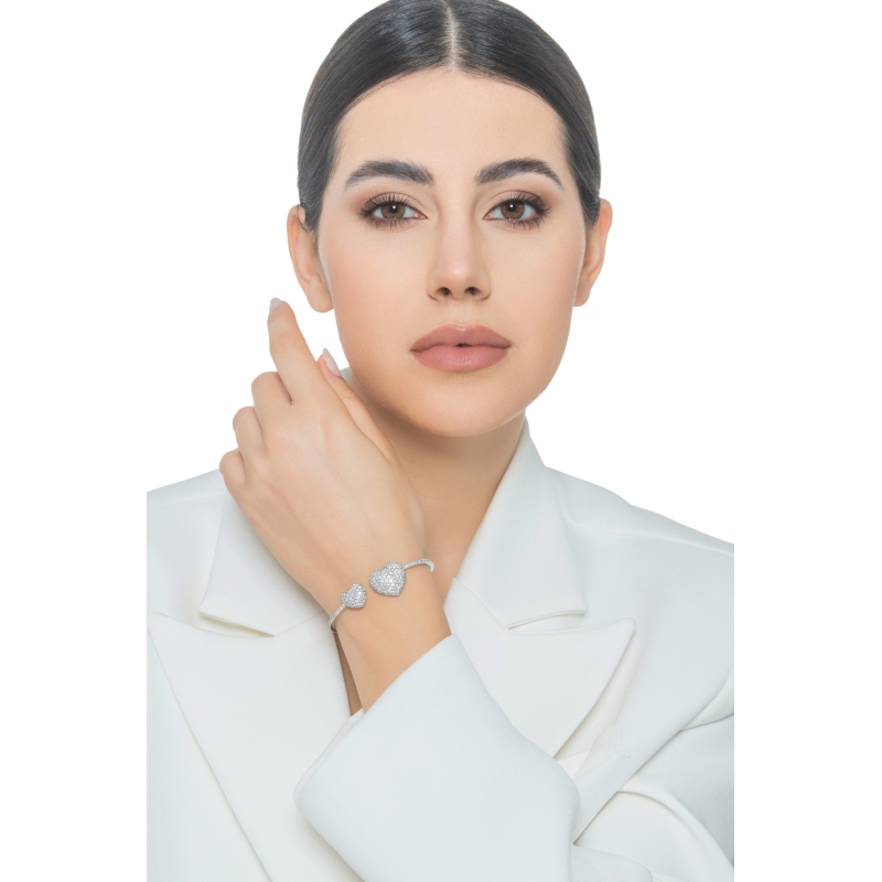 Bracelet in white gold 18k with two hearts in diamonds Bracelet in white gold 18k with two hearts in diamonds