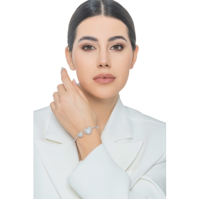 Bracelet in white gold 18k with two hearts in diamonds