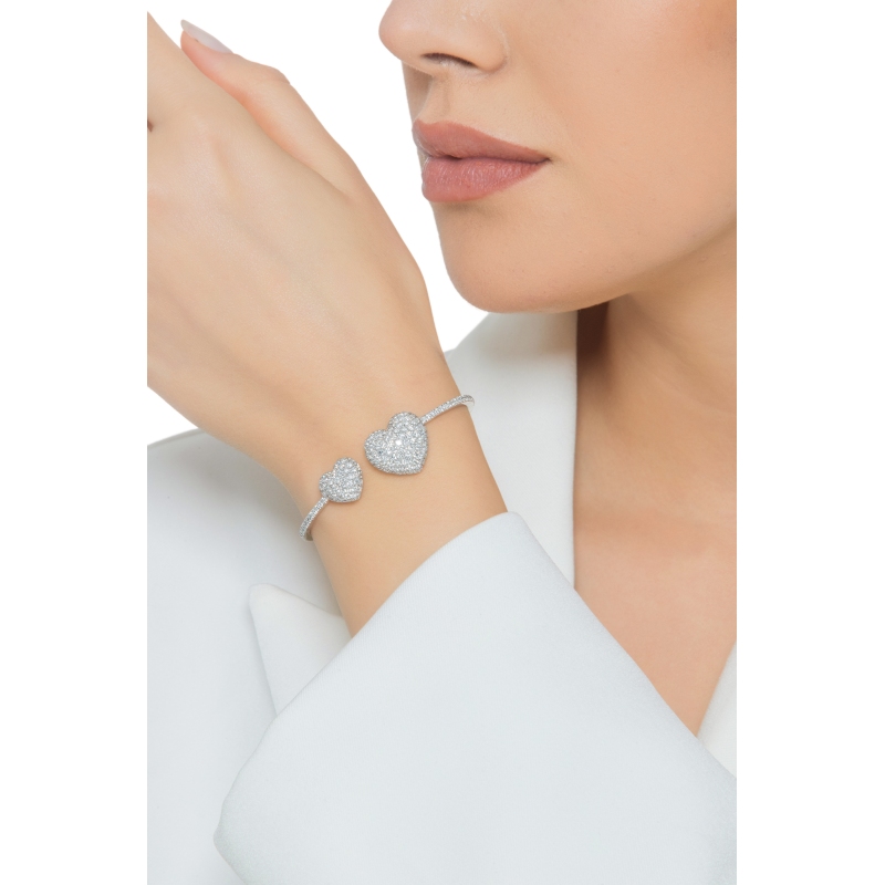 Bracelet in white gold 18k with two hearts in diamonds Bracelet in white gold 18k with two hearts in diamonds