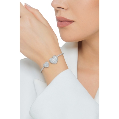 Bracelet in white gold 18k with two hearts in diamonds