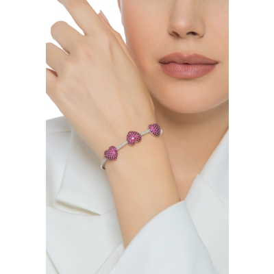 750 white gold bracelet with diamonds and three hearts in rubies 