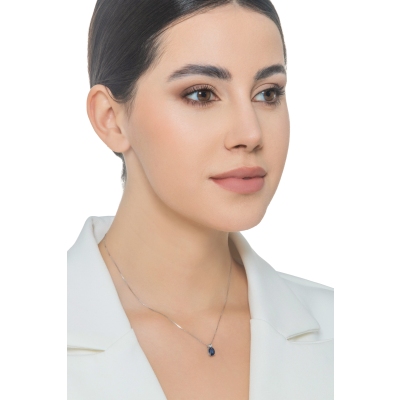 Oval sapphire and diamond pendant