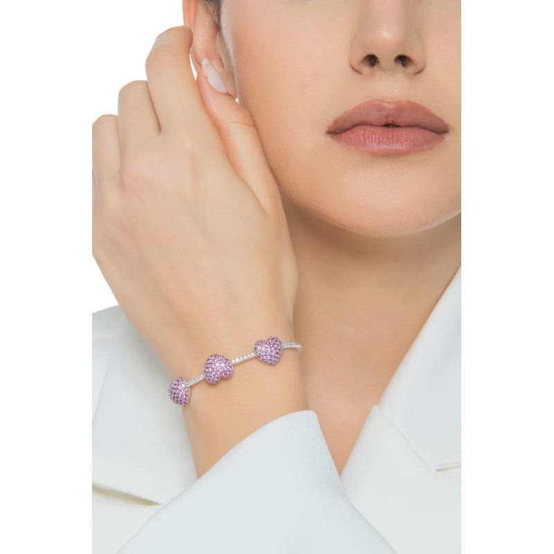 Bracelet in white gold 18k with diamonds and three hearts in pink sapphires Bracelet in white gold 18k with diamonds and three hearts in pink sapphires