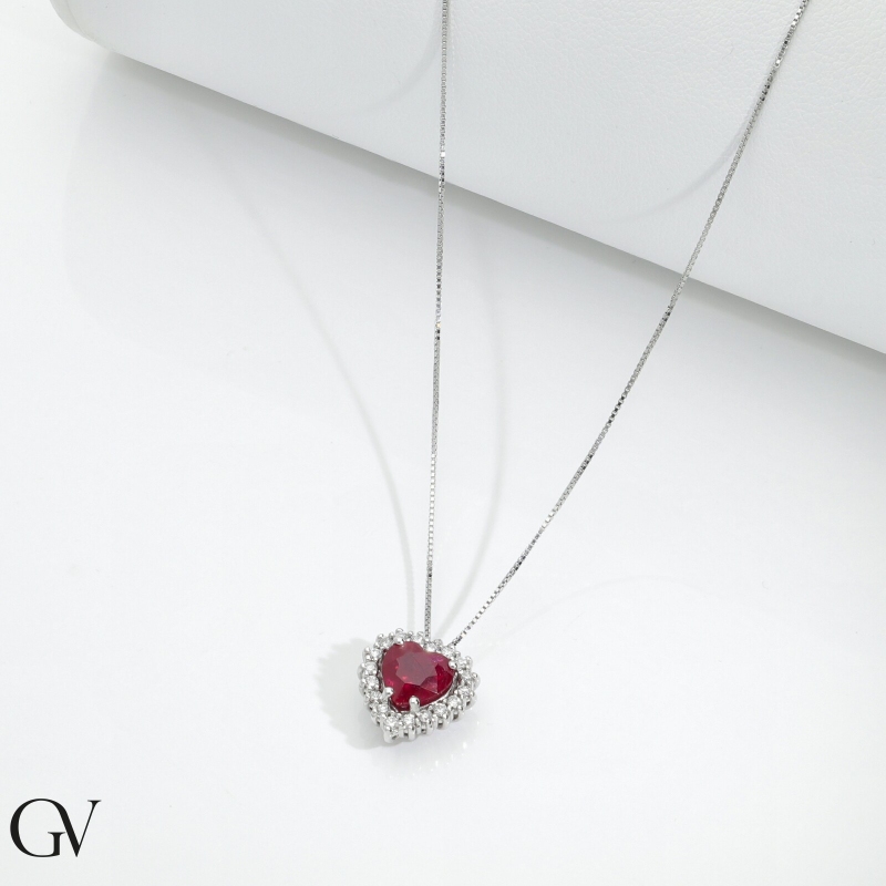18k white gold necklace with a heart-shaped ruby pendant surrounded by diamonds
