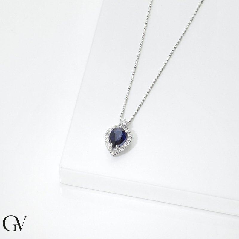 Necklace in white gold 18k with blue sapphire pear cut and diamonds Necklace in white gold 18k with blue sapphire pear cut and diamonds