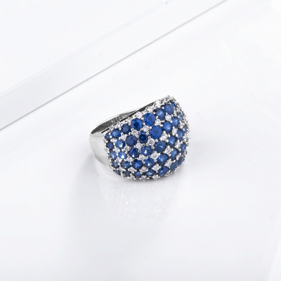 Design ring in white gold 18k with blue sapphires and diamonds