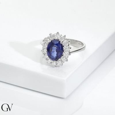 18k white gold ring with oval blue sapphire and diamonds