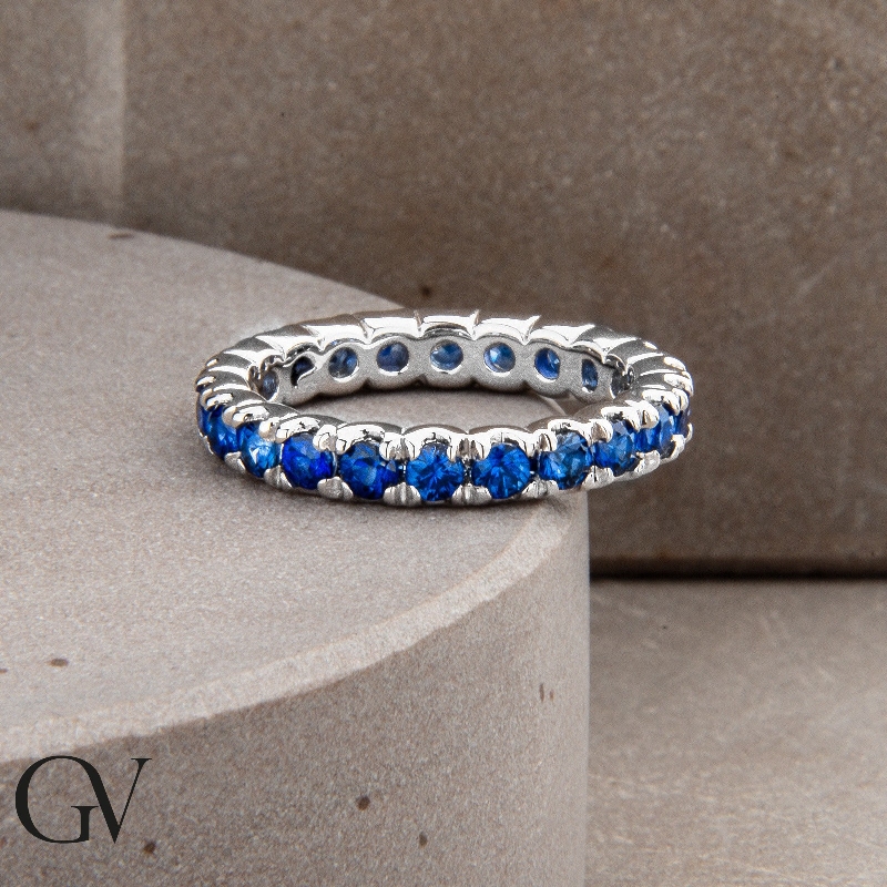 White gold 18k eternity ring with blue sapphires White gold 18k eternity ring with blue sapphires