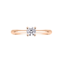 Four prong solitaire ring 