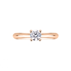 Four prong solitaire ring 