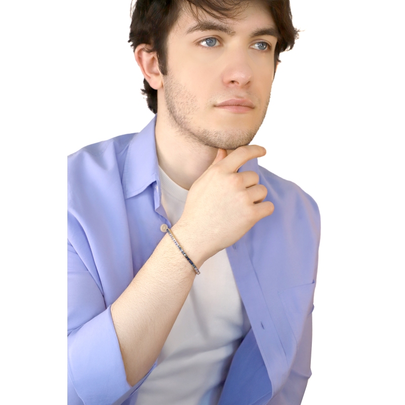 Fancy 18k rose gold tennis bracelet with blue sapphires