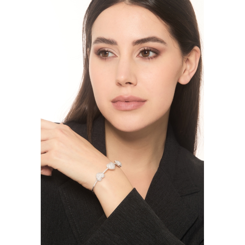 750 white gold spring bracelet with 3 hearts in diamonds 750 white gold spring bracelet with 3 hearts in diamonds