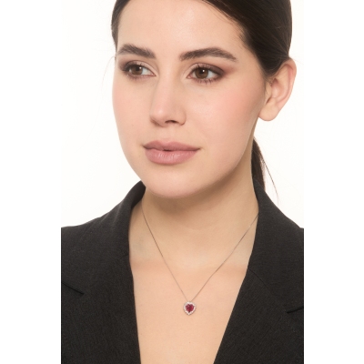 18k white gold necklace with a heart-shaped ruby pendant surrounded by diamonds