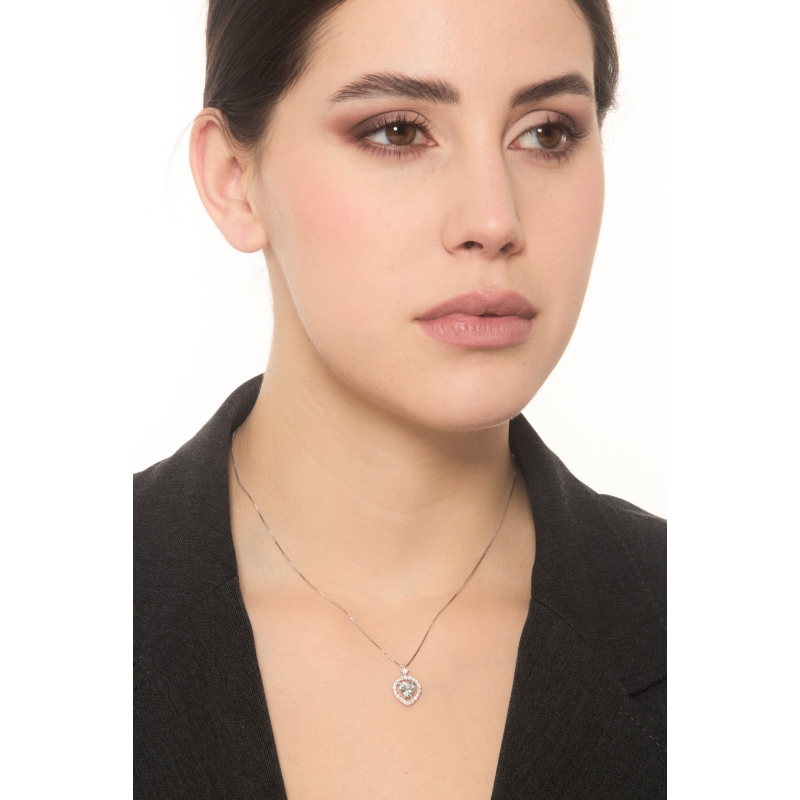 Necklace in white gold 18k with aquamarine heart shaped pendant and diamonds Necklace in white gold 18k with aquamarine heart shaped pendant and diamonds