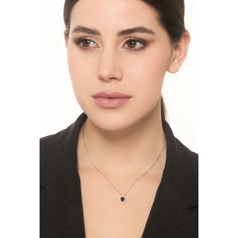 Necklace in white gold 18k with blue sapphire pear cut and diamonds Necklace in white gold 18k with blue sapphire pear cut and diamonds