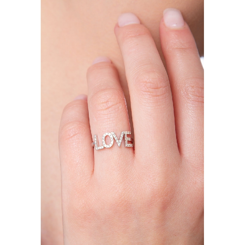Letter ring LOVE in gold and diamonds Letter ring LOVE in gold and diamonds