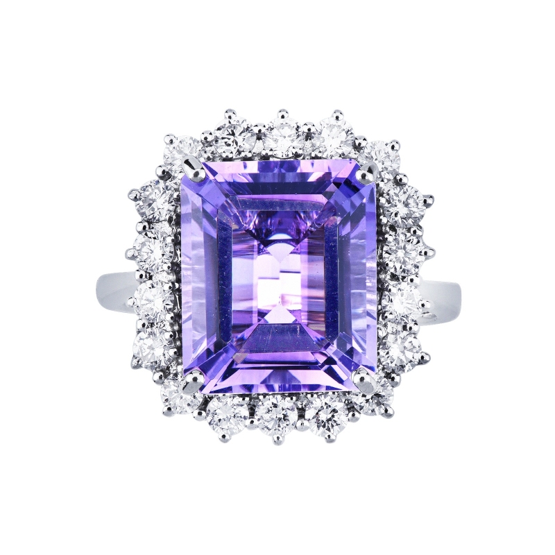 Emerald-cut amethyst diamond halo ring in 18kt white gold Emerald-cut amethyst diamond halo ring in 18kt white gold