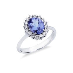 Halo ring with tanzanite and diamonds in white gold 18k
