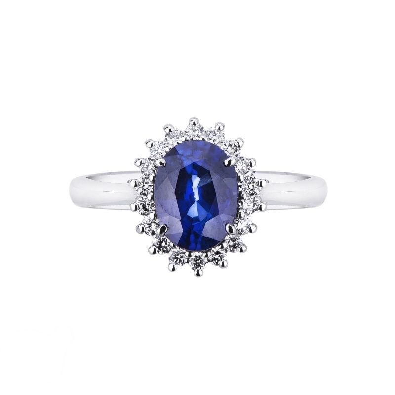 White gold 18k ring with a blue sapphire and diamonds  White gold 18k ring with a blue sapphire and diamonds