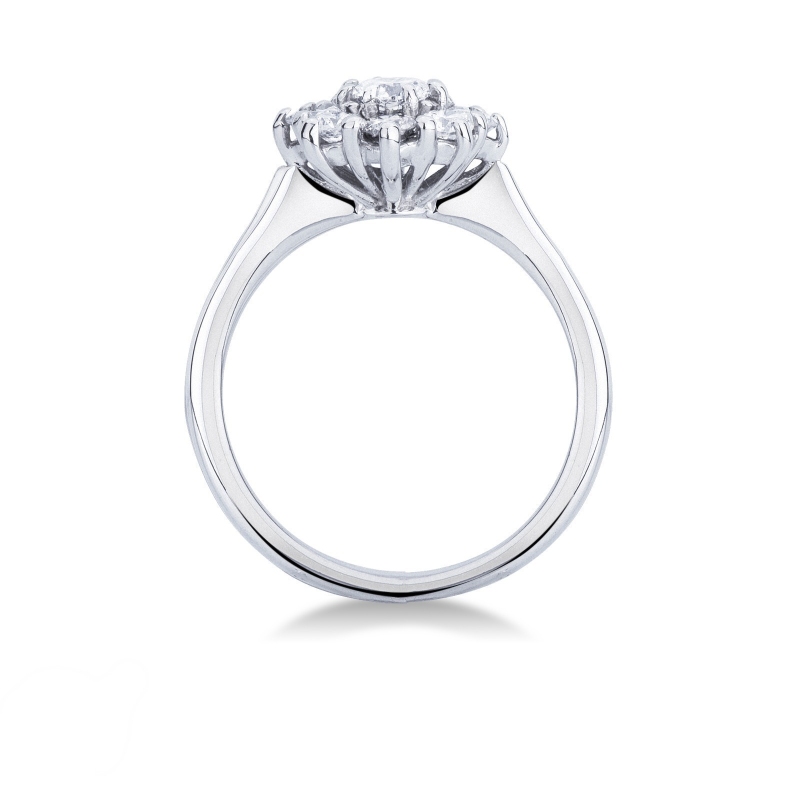 Flower shaped halo ring with diamonds in 18k white gold 