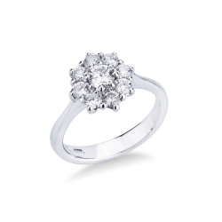 Flower shaped halo ring with diamonds in 18k white gold