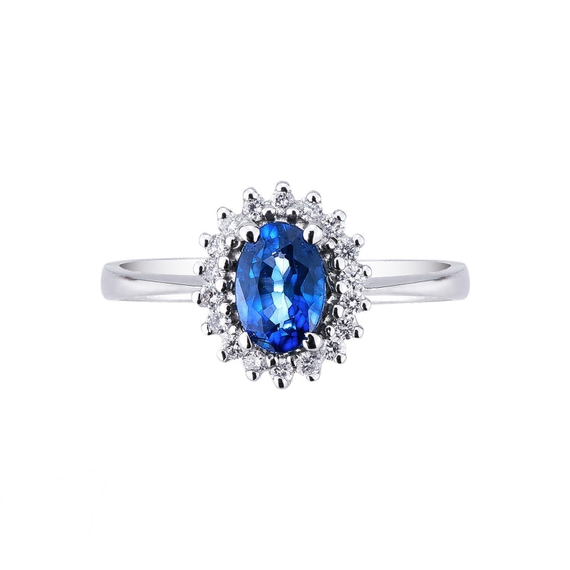 White gold 18k ring with diamonds and blue sapphire oval cut  White gold 18k ring with diamonds and blue sapphire oval cut