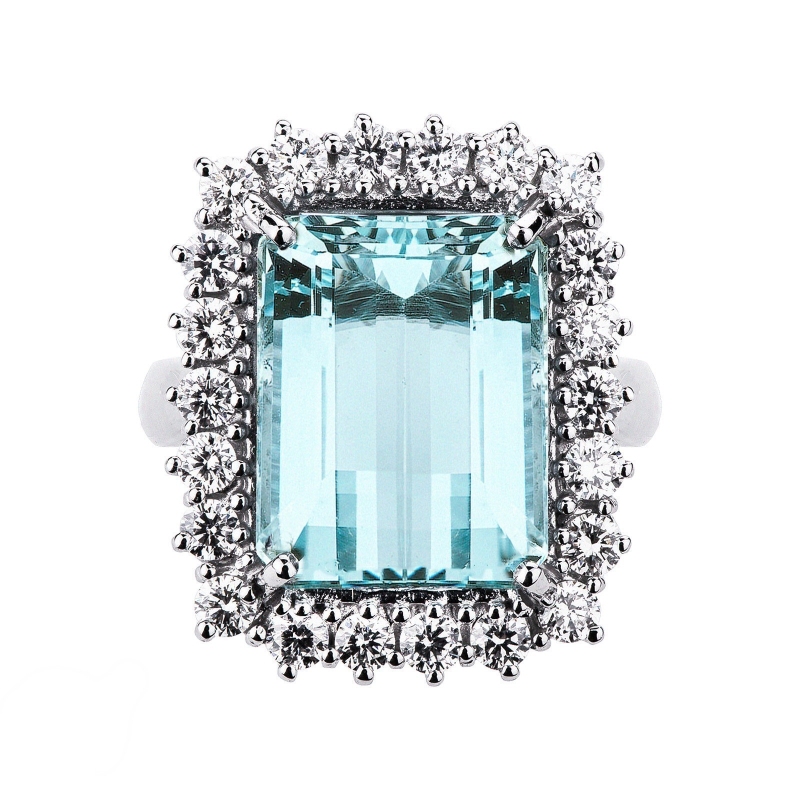 Halo ring white gold 18k with diamonds and aquamarine  Halo ring white gold 18k with diamonds and aquamarine