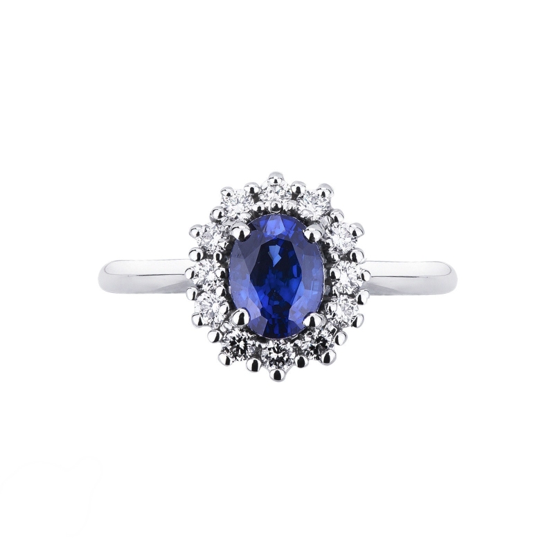 Halo ring white gold 18k with blue sapphire and diamonds  Halo ring white gold 18k with blue sapphire and diamonds