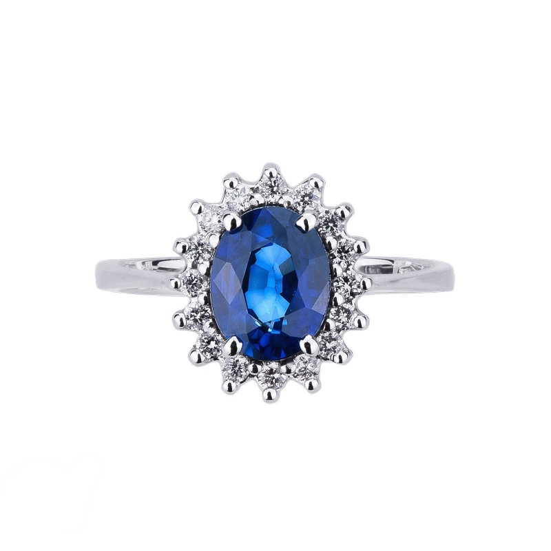 Halo ring white gold 18k with a central blue sapphire and diamonds  Halo ring white gold 18k with a central blue sapphire and diamonds